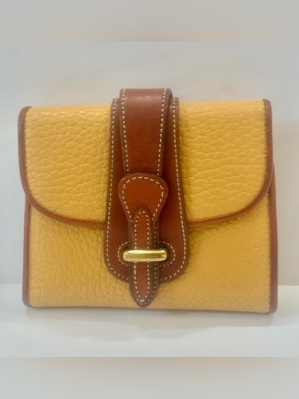 Dooney & Bourke Vintage Yellow and Brown All Weather Leather Women’s wallet